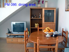 PM 086 dining area of this two bedroom villa near la marquesa golf course, ciudad quesada, costa blanca, spain